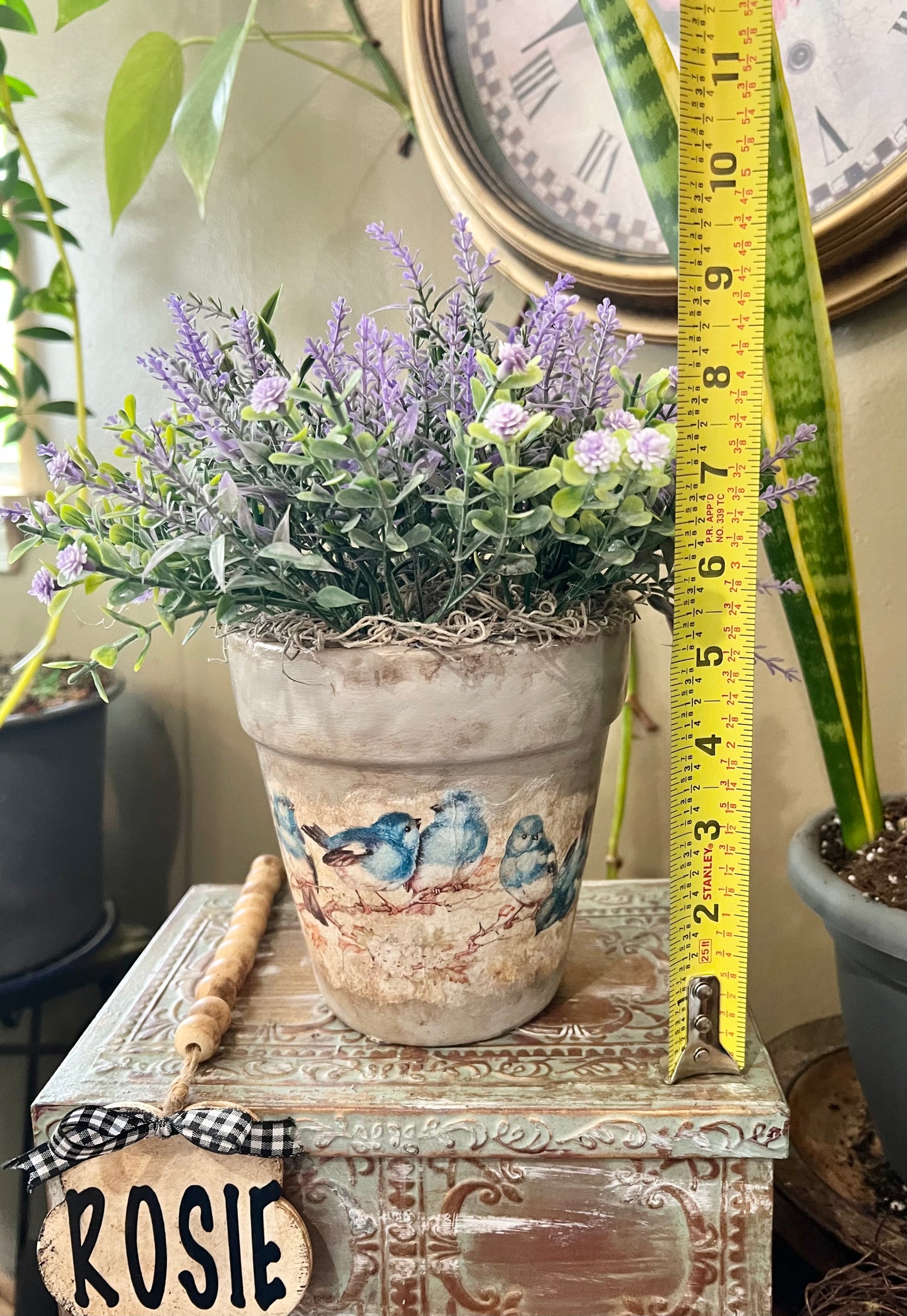 Lavender artificial flower plant in terra cotta pot