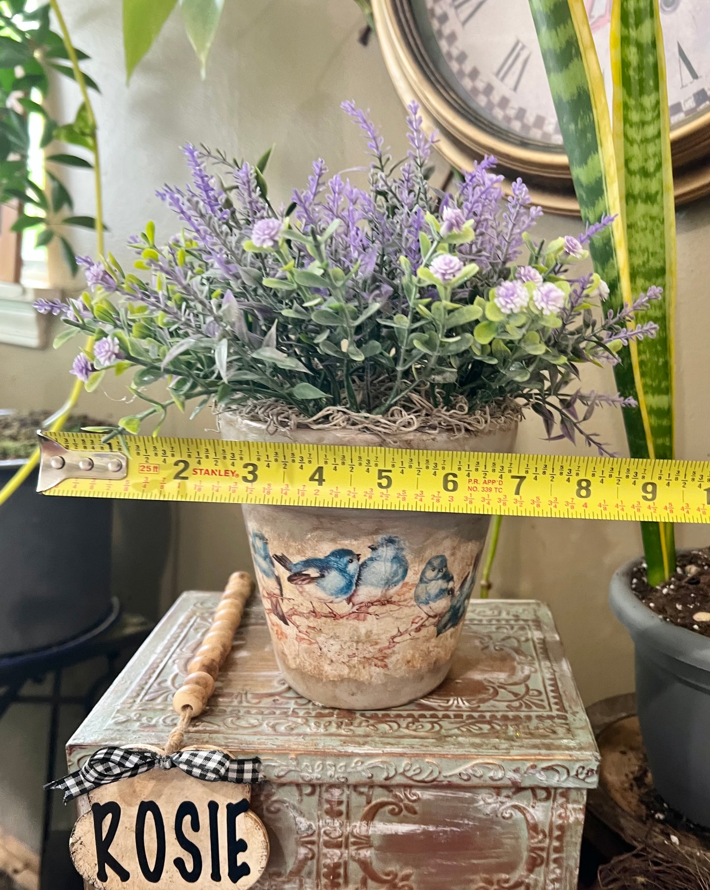 Lavender artificial flower plant in terra cotta pot