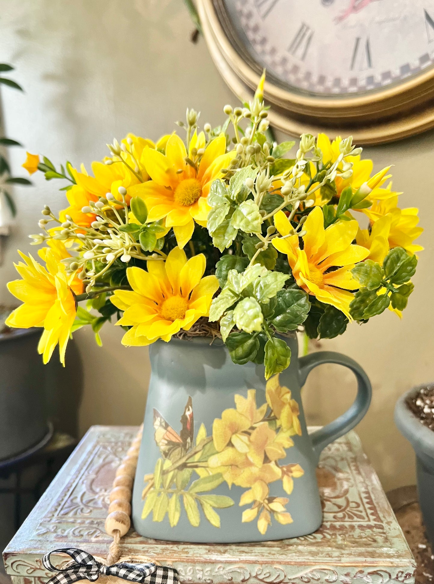 Yellow artificial flower arrangement